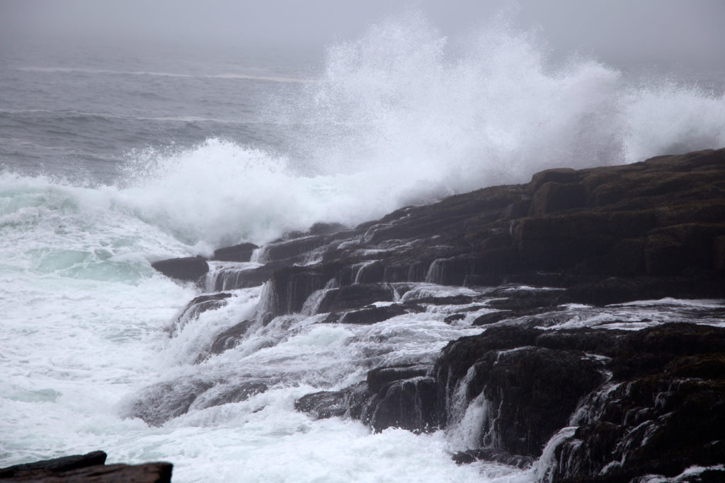 Stormy Waves Crashing on Rocks