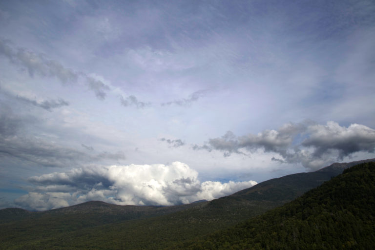 Cloudy Skies Over Mountains