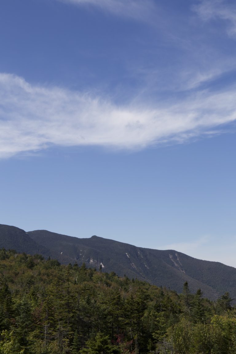 Thin Wispy Clouds Over Mountain Ridge