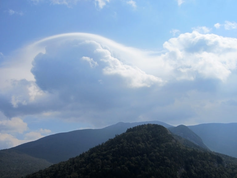 Clouds Over Rolling Mountains