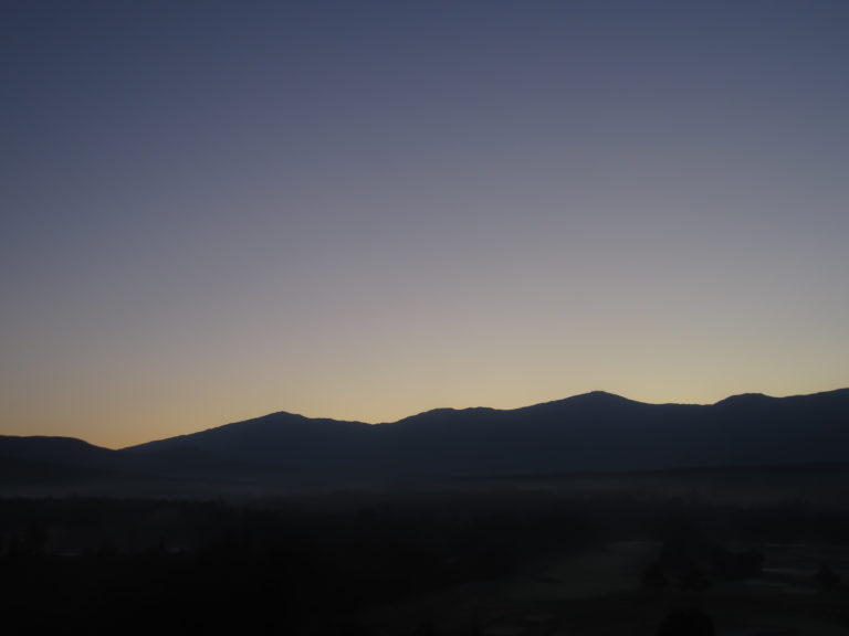 Gradient Sky and Mountain Silhouette