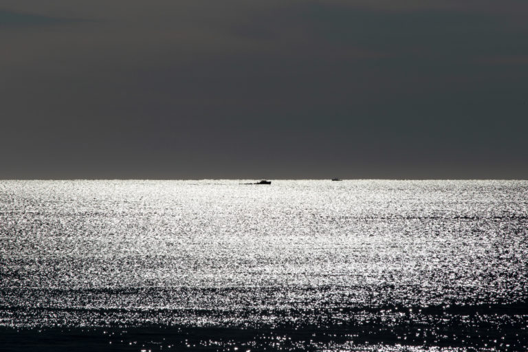 Small Boat on the Horizon, Black and White
