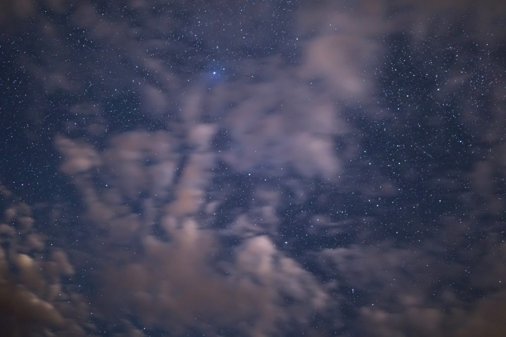 Stars Peeking Through Thin Pink Clouds