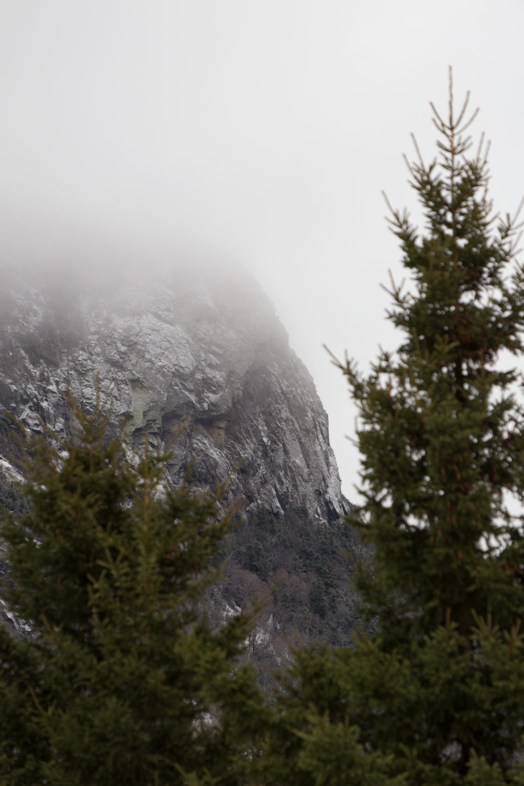 Sheer Rocky Mountainside in the Mist