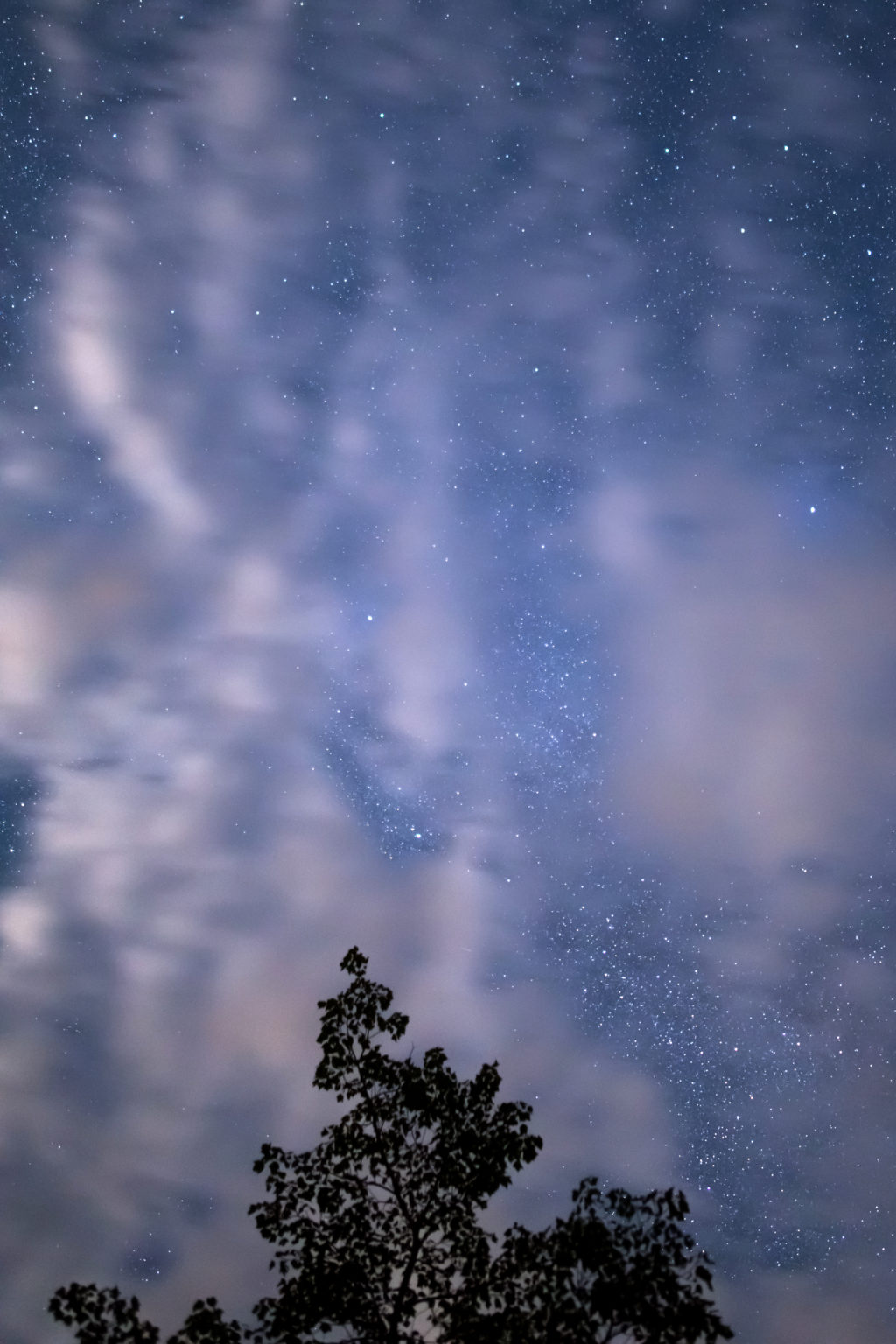 Glimpses of Stars Through Clouds