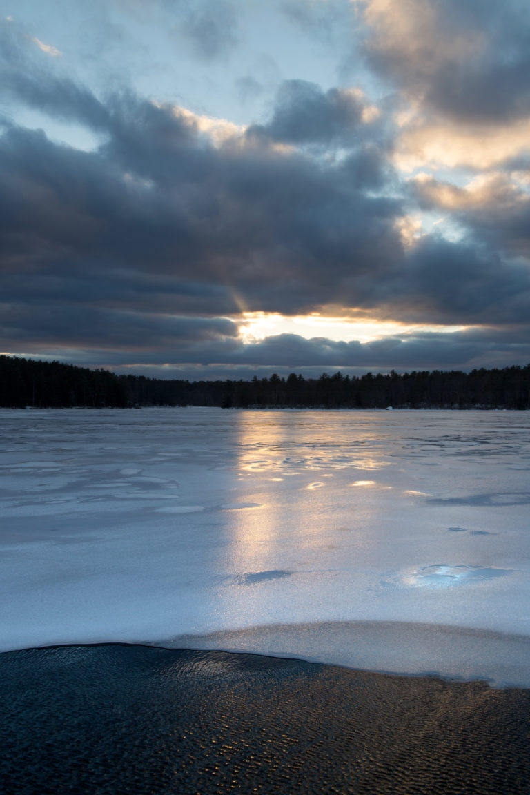 Sunlight Reflected on Icy Lake