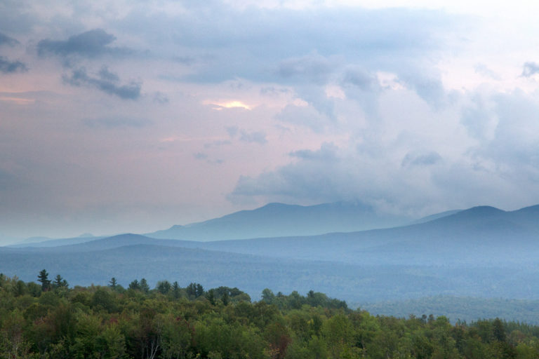 Foggy Layered Mountain Silhouettes